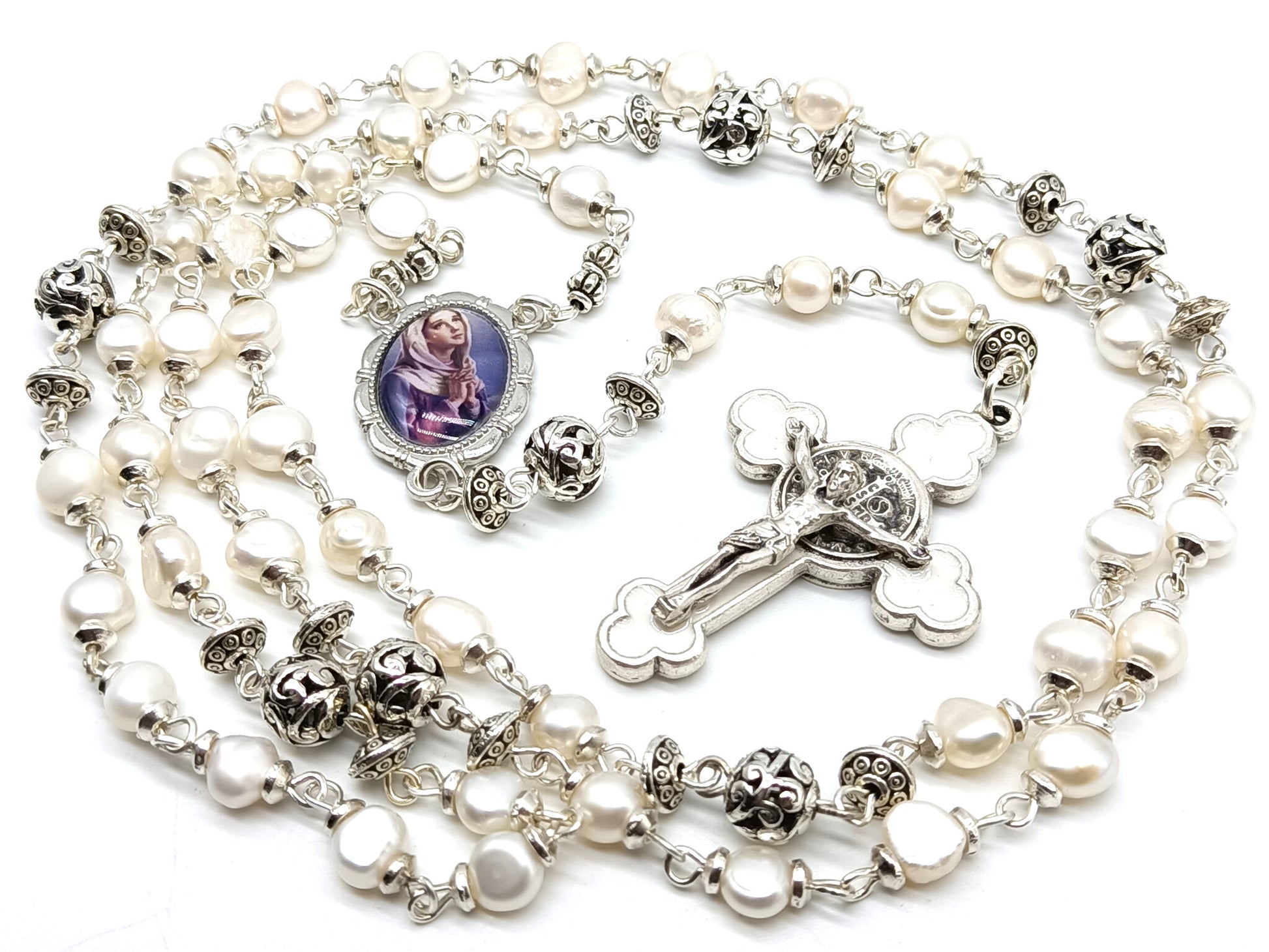 Genuine pearl unique dolor rosary with white enamel crucifix and silver Our Lady picture medal and silver dolour beads.