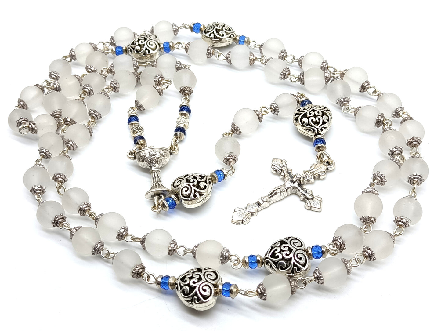 Childs unique rosary beads with white glass beads and silver crucifix and centre medal.