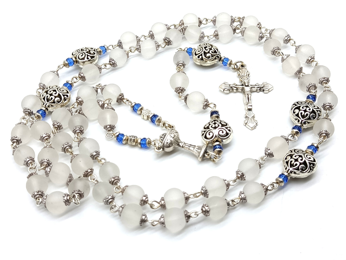 Childs unique rosary beads with white glass beads and silver crucifix and centre medal.