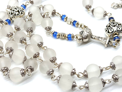 Childs unique rosary beads with white glass beads and silver crucifix and centre medal.