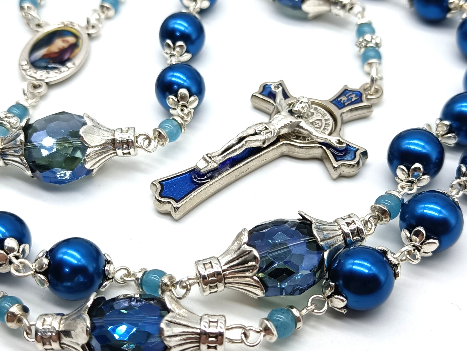 Our Lady of Sorrows unique rosary beads with blue glass beads, blue enamel crucifix and silver centre medal.