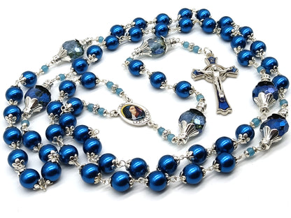 Our Lady of Sorrows unique rosary beads with blue glass beads, blue enamel crucifix and silver centre medal.
