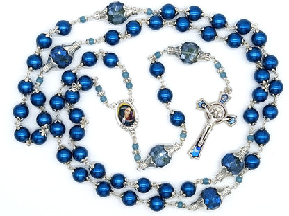 Our Lady of Sorrows unique rosary beads with blue glass beads, blue enamel crucifix and silver centre medal.