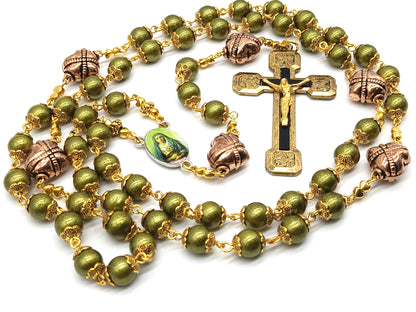 Green glass rosary with copper, gold and black crucifix and Our Lady of Sorrows medal.