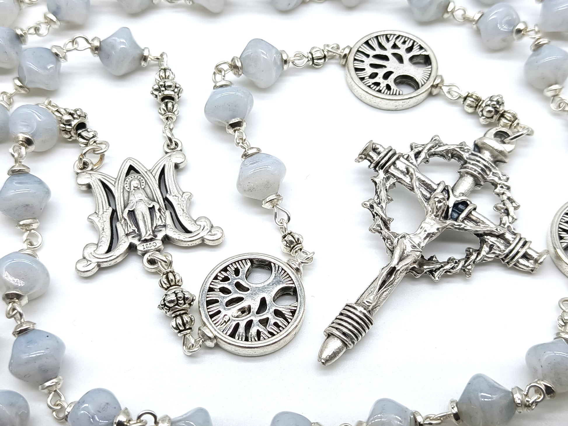 Tree of life rosary beads with white lamp glass and silver crucifix and miraculous medal centre.