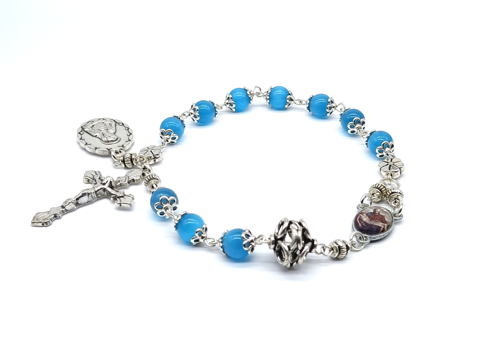 Pocket servite unique dolor rosary beads with blue glass beads and silver crucifix, medals and dolour bead.