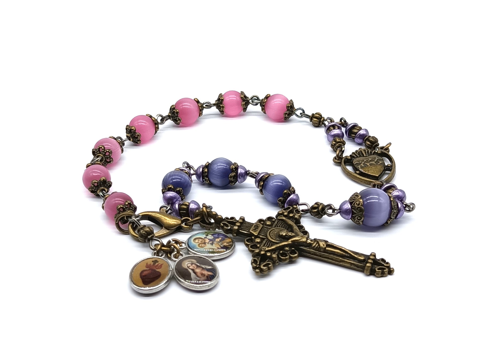 Pocket servite unique dolor rosary in pink and blue glass beads and bronze crucifix and medal.