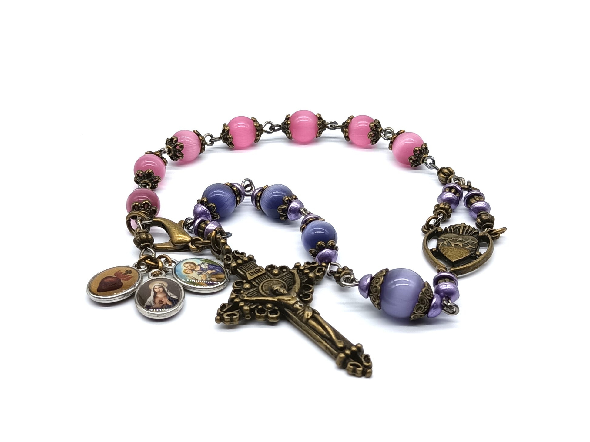 Pocket servite unique dolor rosary in pink and blue glass beads and bronze crucifix and medal.