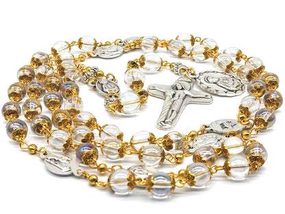 Glass and gold unique dolor rosary beads with silver dolour medals, crucifix and gold bead caps.