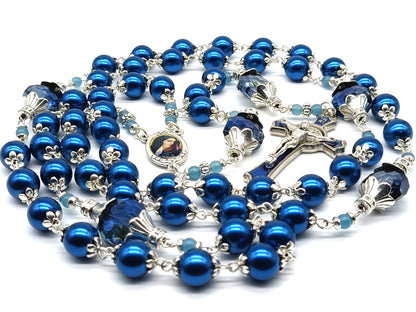 Our Lady of Sorrows unique rosary beads with blue glass beads, blue enamel crucifix and silver centre medal.