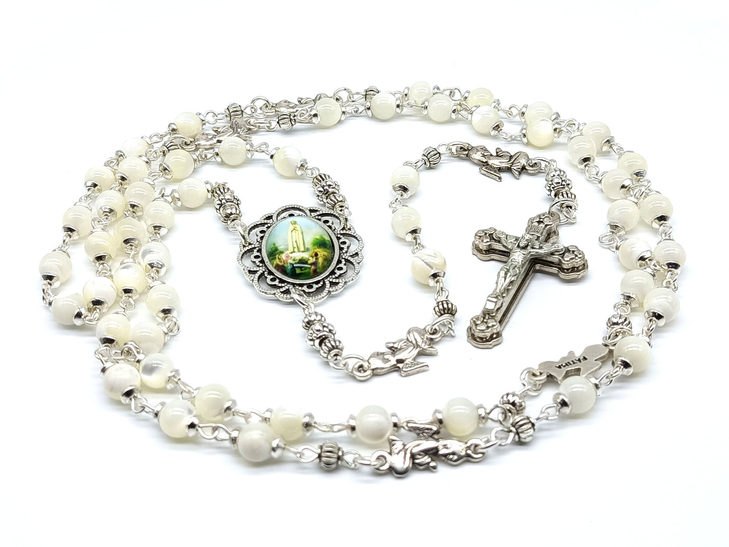 Mother of Pearl Fatima unique rosary beads with silver angel pater beads, crucifix and picture centre medal.