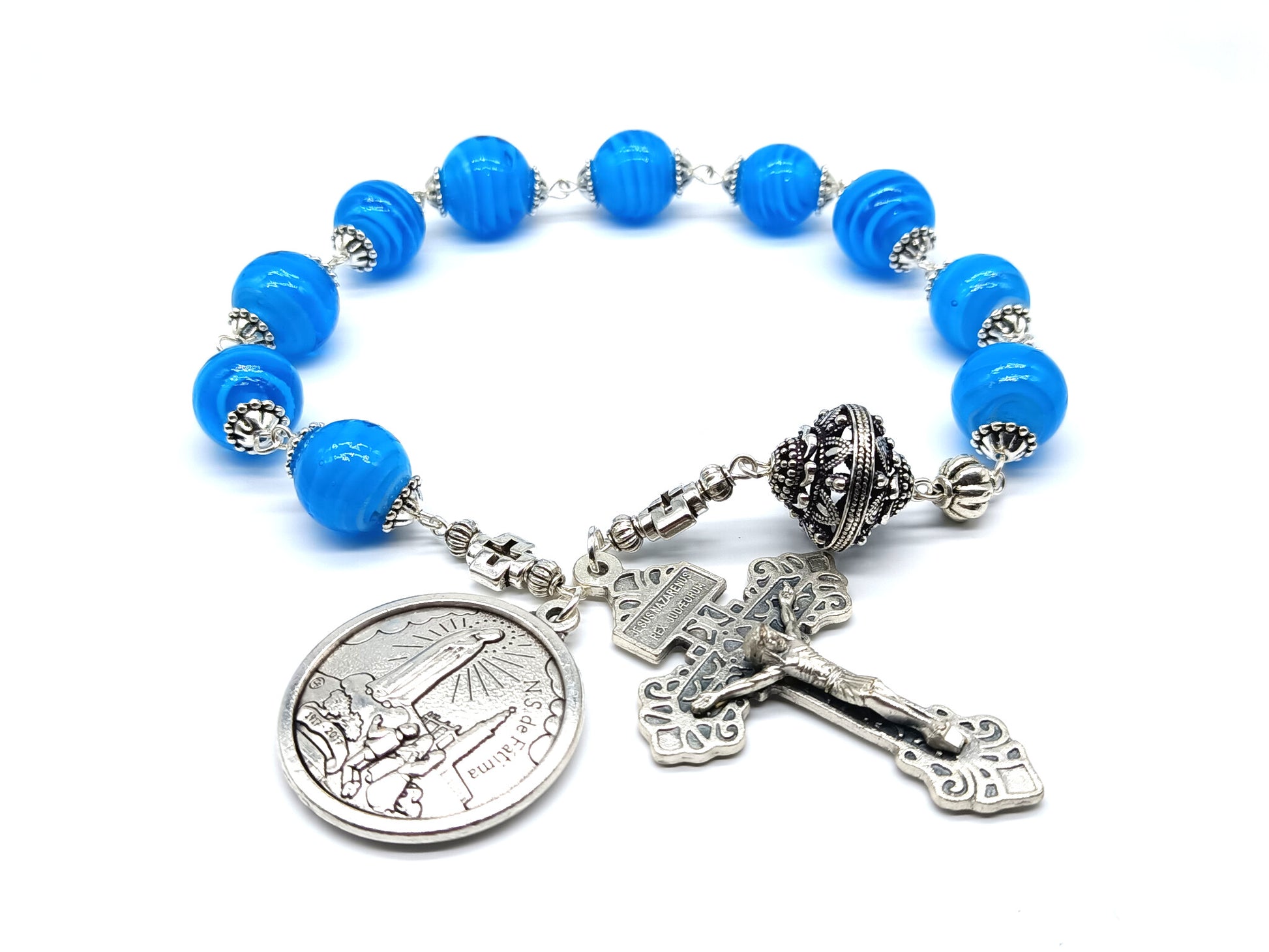 Fatima single decade unique rosary beads with blue swirl glass beads, silver pardon crucifix, pater bead and centenary centre medal.