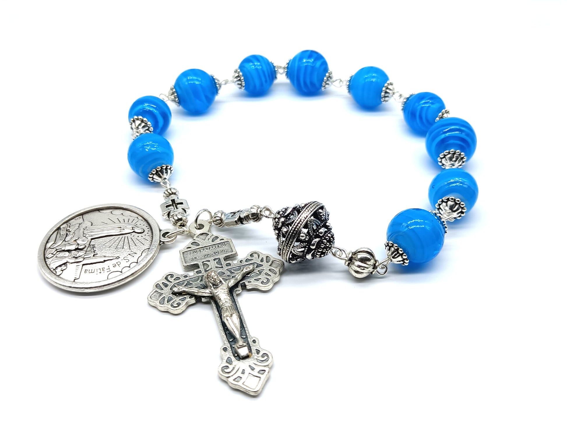 Fatima single decade unique rosary beads with blue swirl glass beads, silver pardon crucifix, pater bead and centenary centre medal.