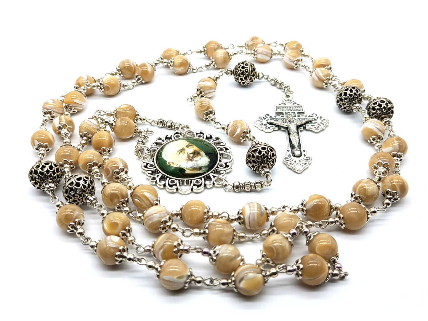 Saint Padre Pio unique rosary beads with mother of pearl beads, silver pater beads, crucifix and picture centre medal.