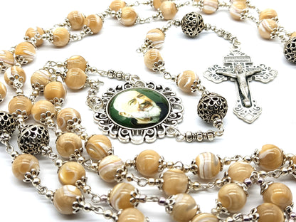 Saint Padre Pio unique rosary beads with mother of pearl beads, silver pater beads, crucifix and picture centre medal.
