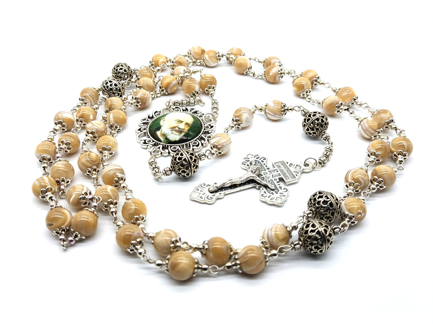 Saint Padre Pio unique rosary beads with mother of pearl beads, silver pater beads, crucifix and picture centre medal.