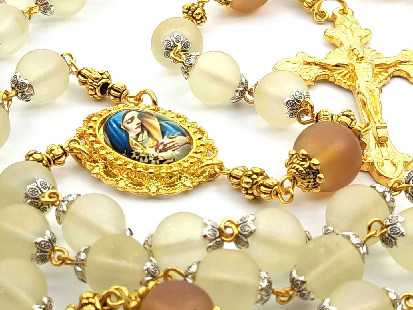 The Immaculate Heart of Mary unique rosary beads with pale frosted glass beads, gold crucifix, picture centre medal and bead caps.
