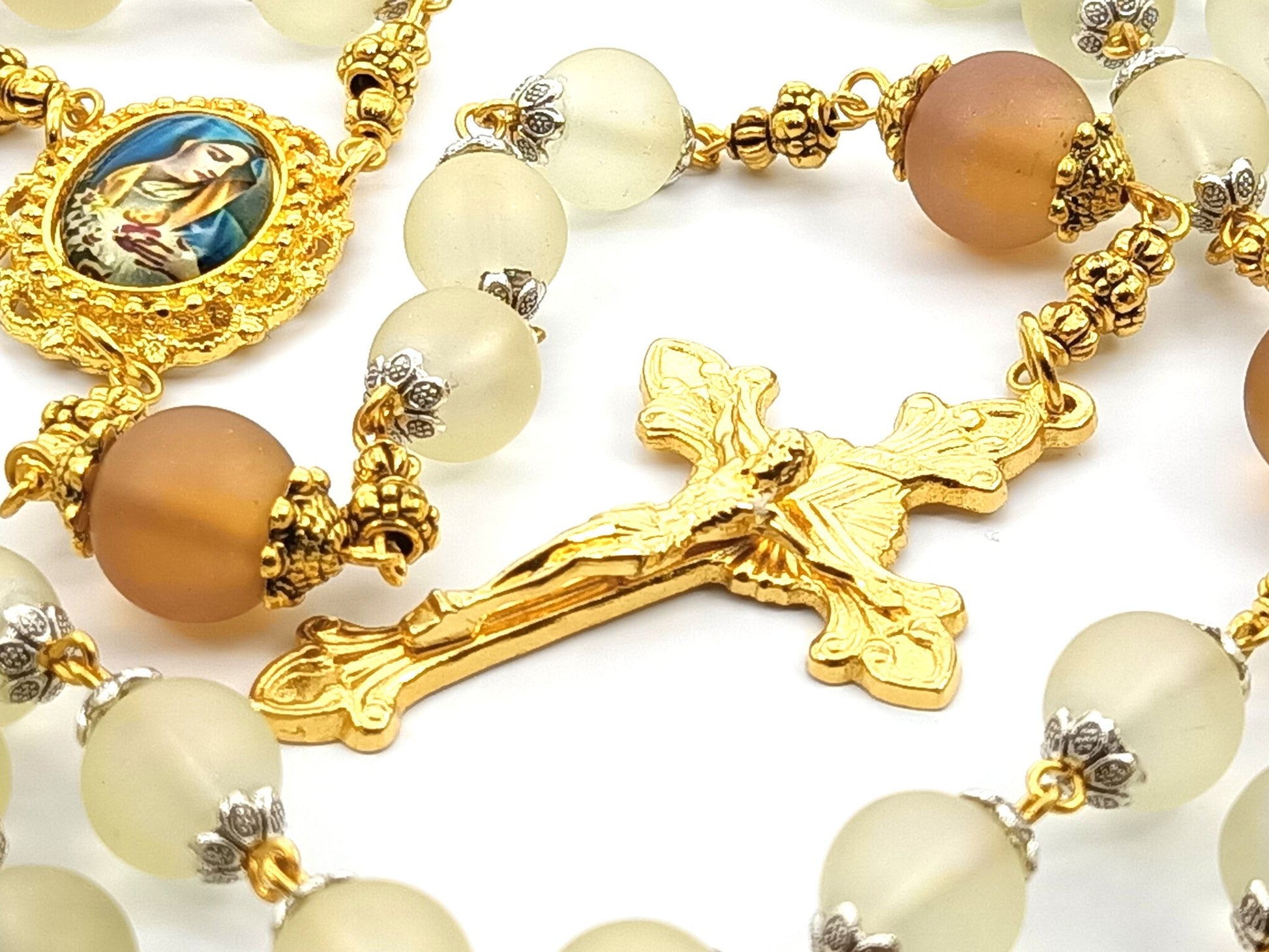 The Immaculate Heart of Mary unique rosary beads with pale frosted glass beads, gold crucifix, picture centre medal and bead caps.