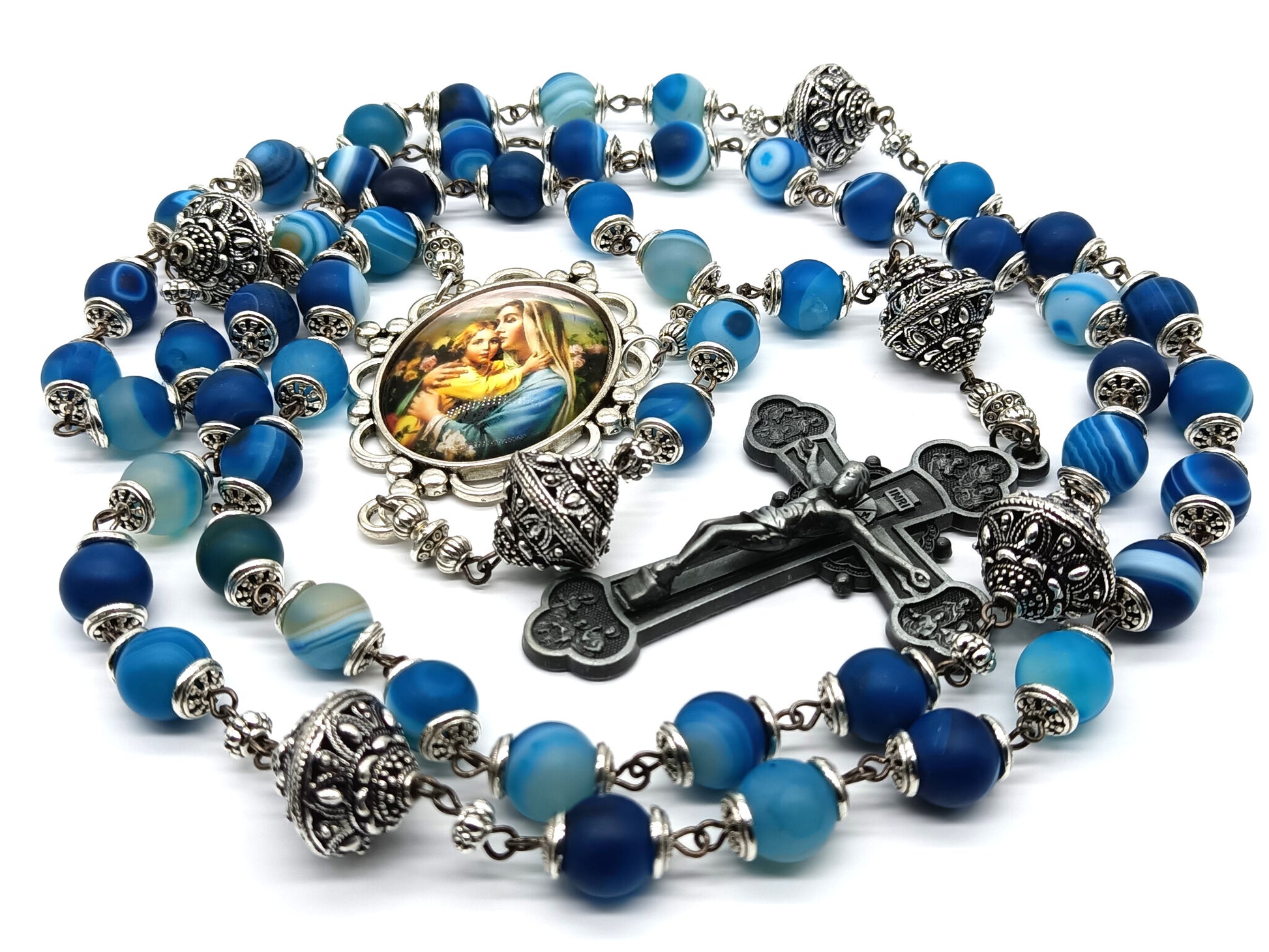 Virgin and Child unique rosary beads with blue gemstone beads, pewter crucifix, silver pater beads, bead caps and picture centre medal.