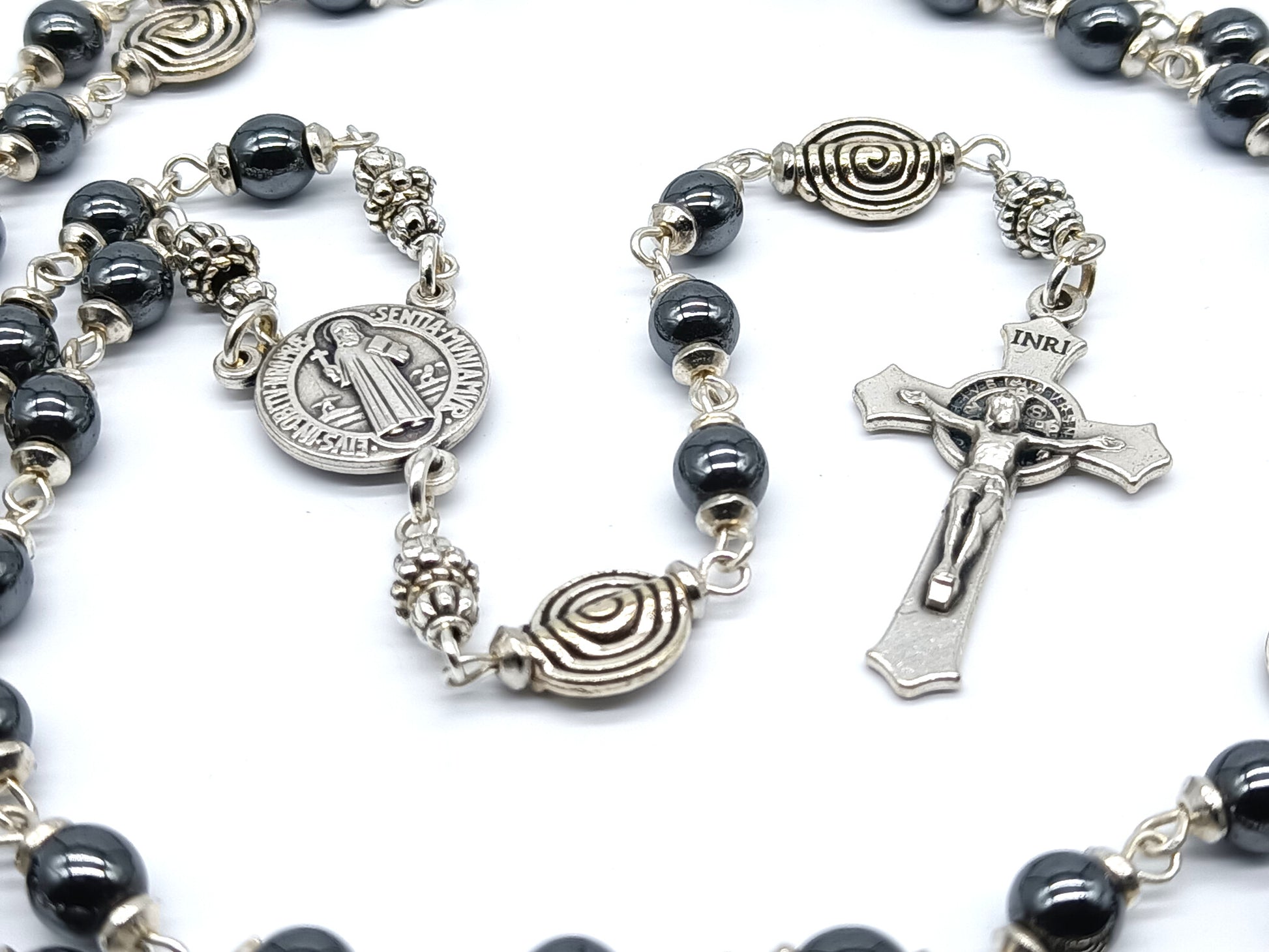 Saint Benedict unique rosary beads with hematite beads, silver St. Benedict crucifix, pater beads and centre medals.