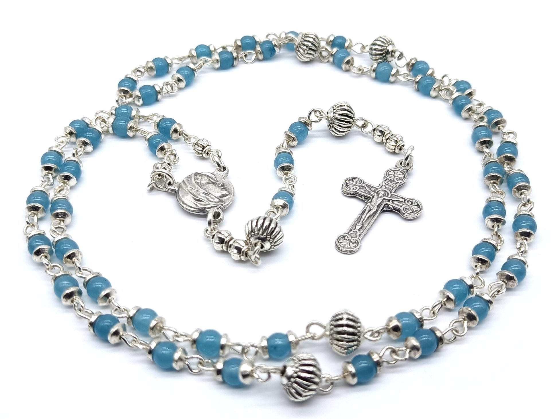 Virgin Mary unique rosary beads with blue gemstone beads, silver pater beads, crucifix and centre medal.