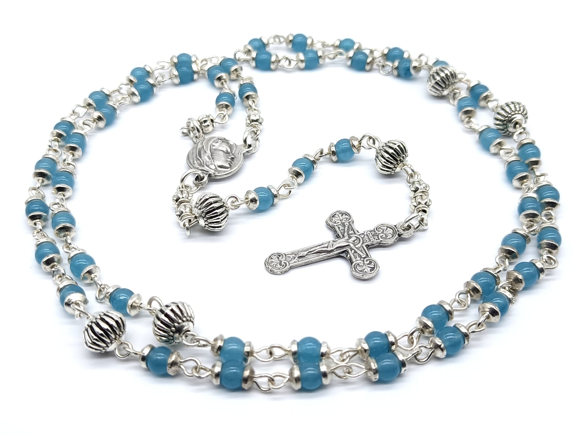 Virgin Mary unique rosary beads with blue gemstone beads, silver pater beads, crucifix and centre medal.