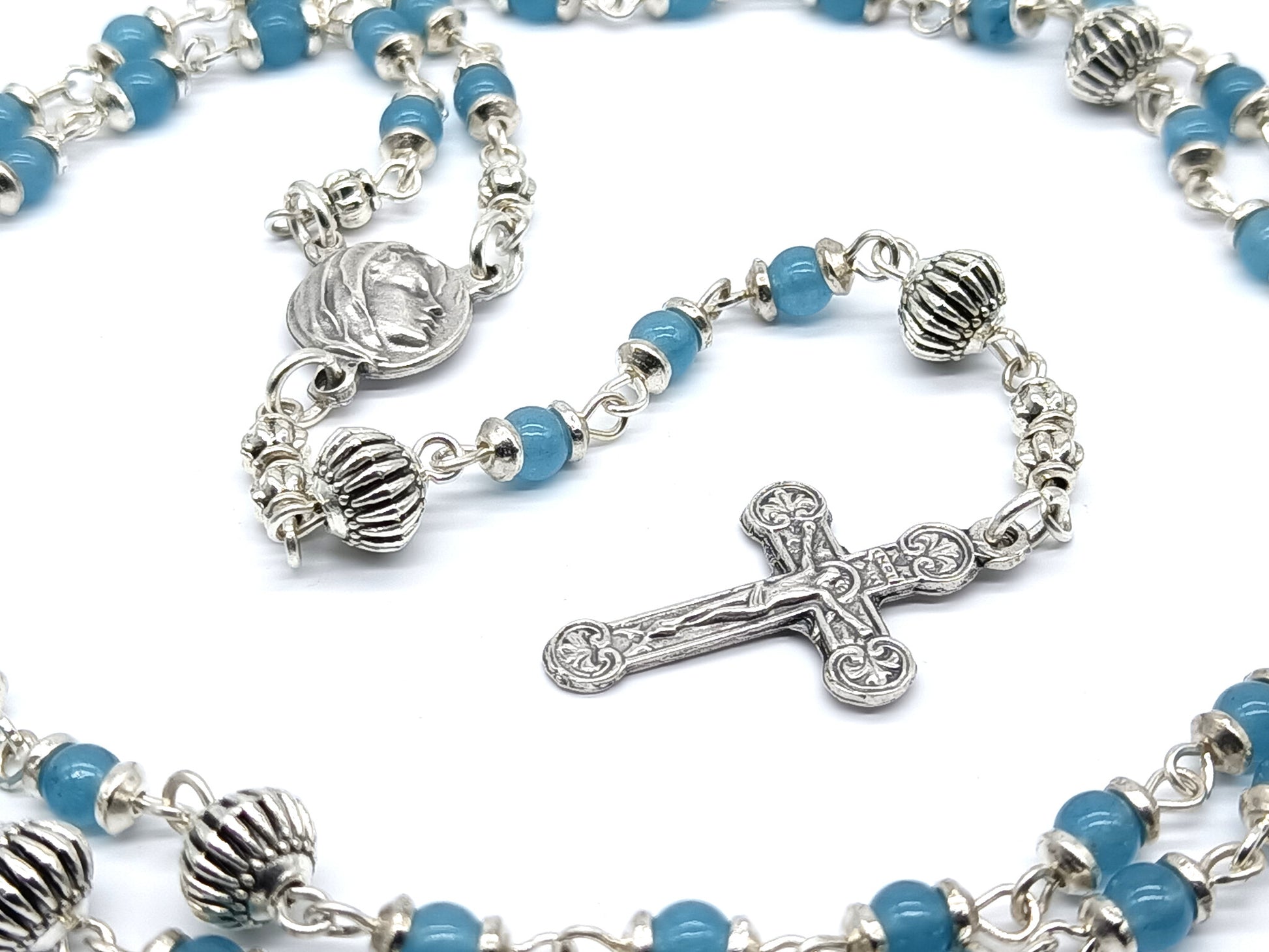 Virgin Mary unique rosary beads with blue gemstone beads, silver pater beads, crucifix and centre medal.