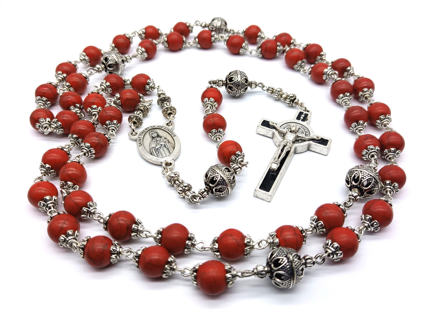 Saint Therese of Lisieux unique rosary beads with red gemstone beads and silver pater beads, caps, black enamel crucifix and medal.