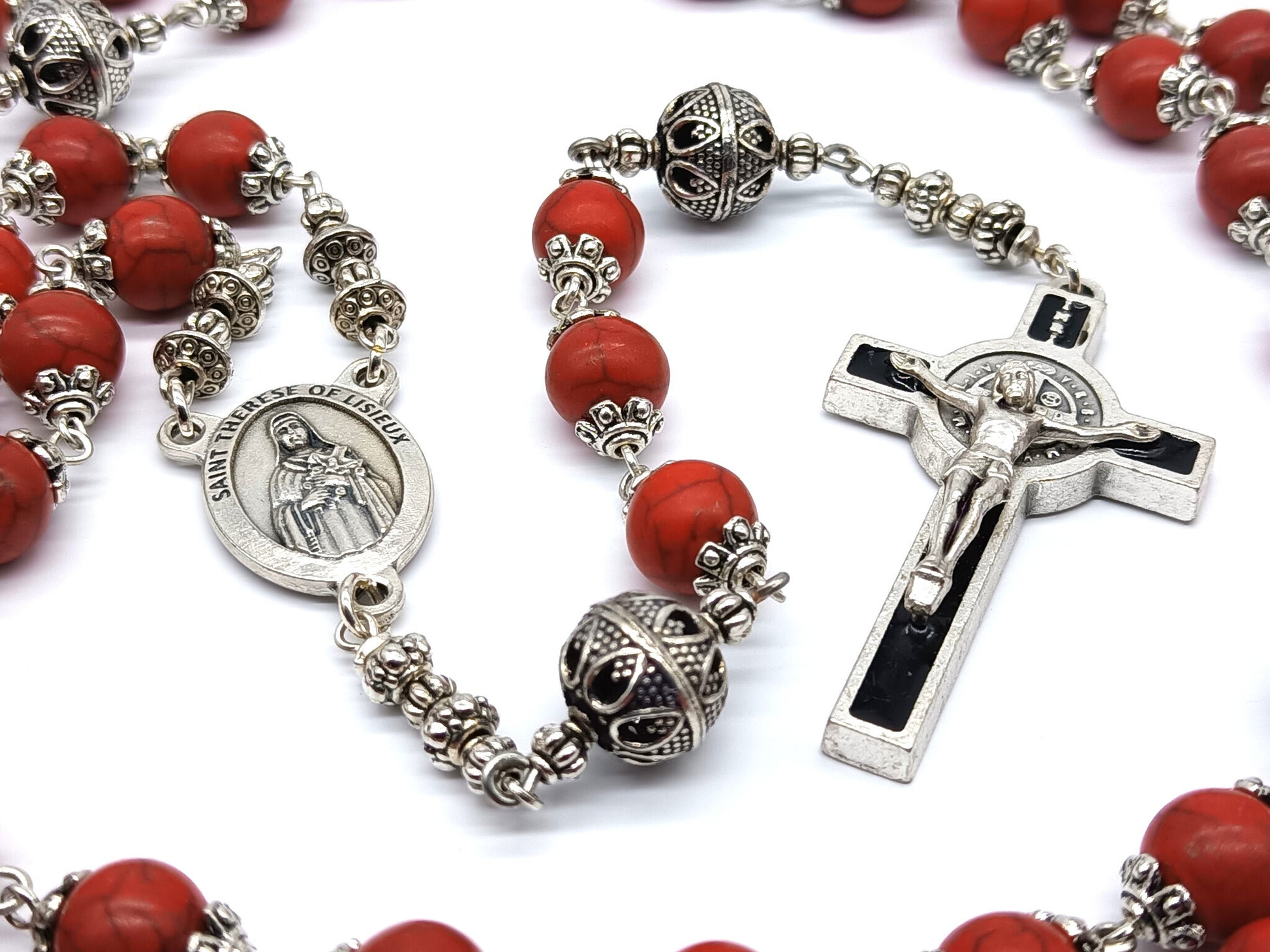 Saint Therese of Lisieux unique rosary beads with red gemstone beads and silver pater beads, caps, black enamel crucifix and medal.