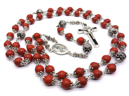 Saint Therese of Lisieux unique rosary beads with red gemstone beads and silver pater beads, caps, black enamel crucifix and medal.