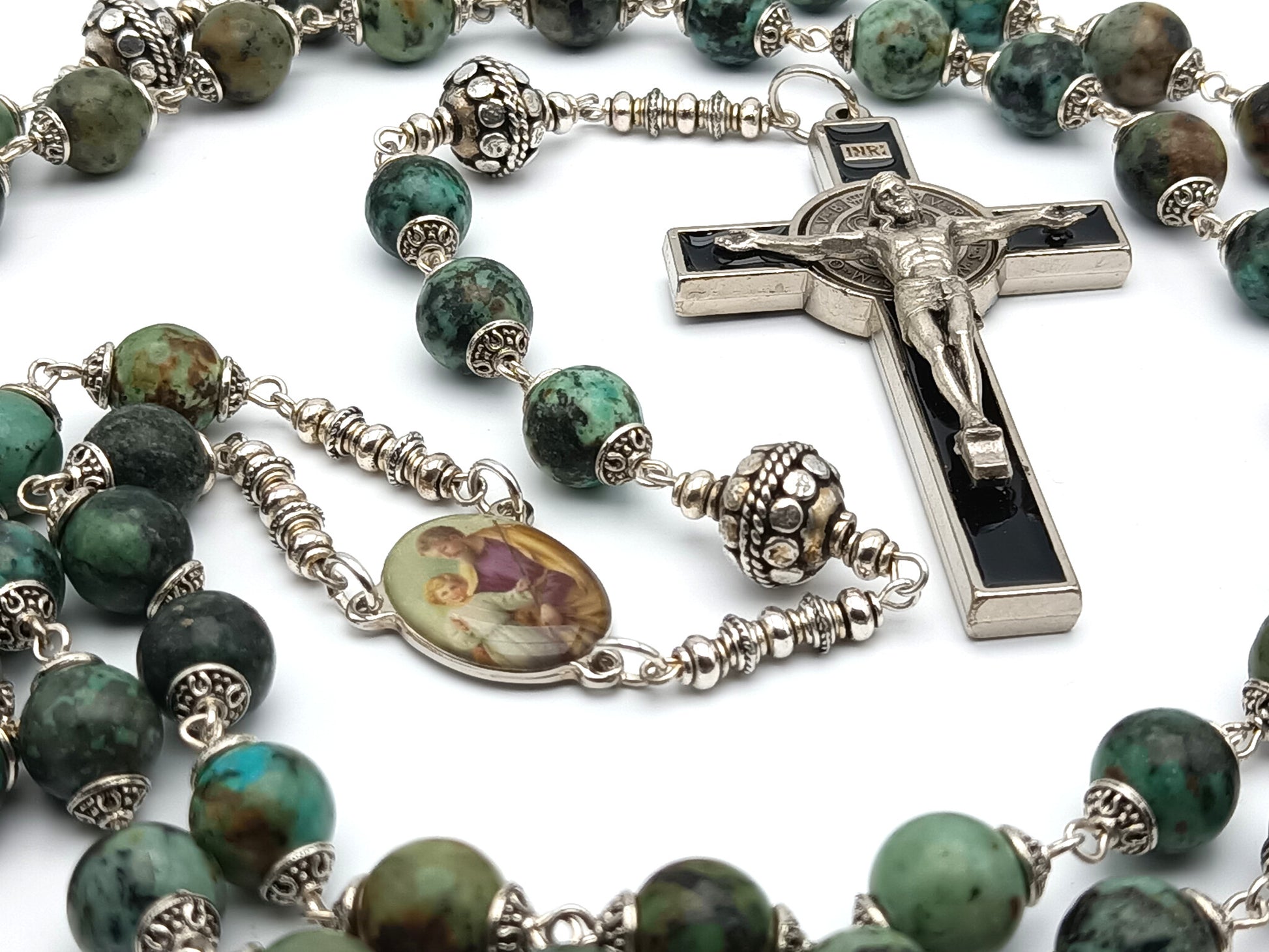 Holy Family unique rosary beads with green gemstone beads, silver pater beads, silver and black enamel crucifix and picture centre medal. 