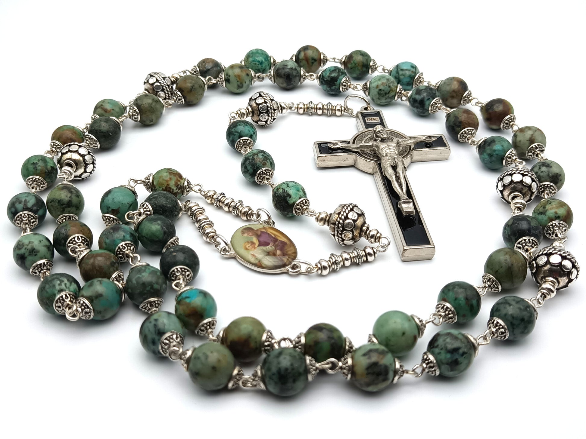Holy Family unique rosary beads with green gemstone beads, silver pater beads, silver and black enamel crucifix and picture centre medal. 