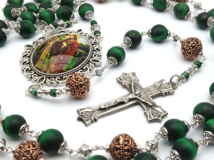 The Good Shepherd unique rosary beads with green tigers eyes beads, silver crucifix, picture centre medal and copper pater beads.