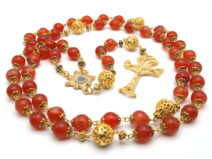 Gold Plated unique rosary beads with flame gemstone beads, gold plated dogwood crucifix, pater beads and centre medal.