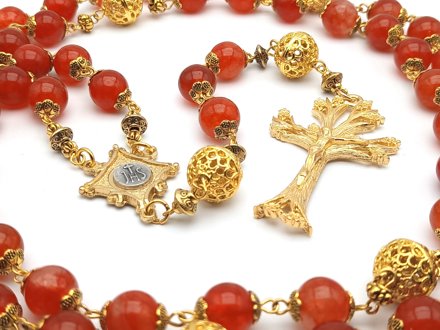 Gold Plated unique rosary beads with flame gemstone beads, gold plated dogwood crucifix, pater beads and centre medal.