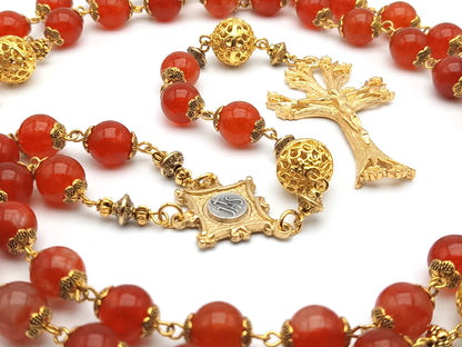 Gold Plated unique rosary beads with flame gemstone beads, gold plated dogwood crucifix, pater beads and centre medal.