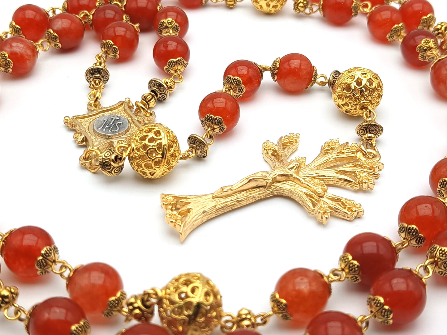 Gold Plated unique rosary beads with flame gemstone beads, gold plated dogwood crucifix, pater beads and centre medal.