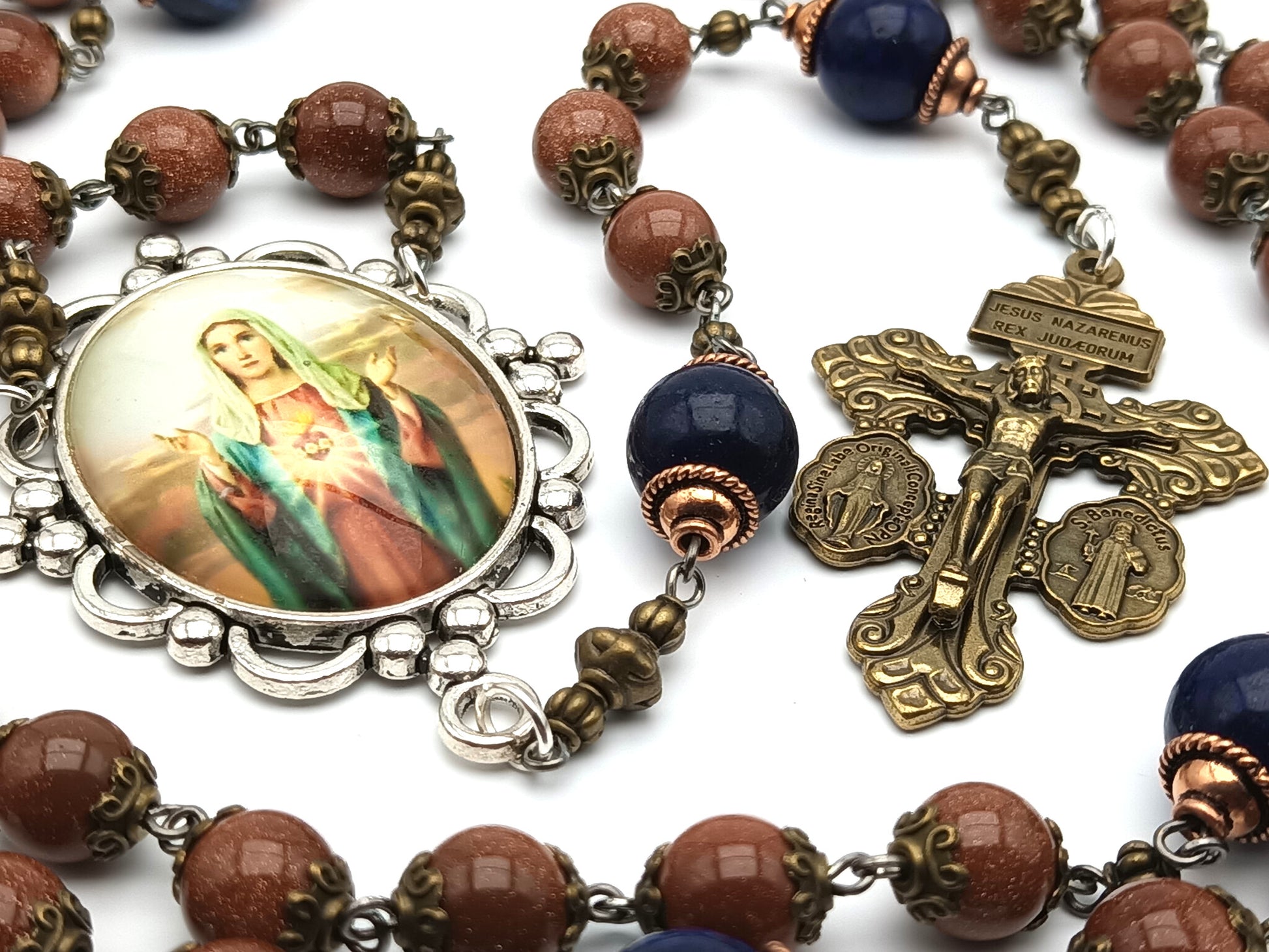 Immaculate Heart unique rosary beads with sparkling rust gemstone beads, blue pater beads, bronze pardon crucifix and silver Our Lady picture centre medal.