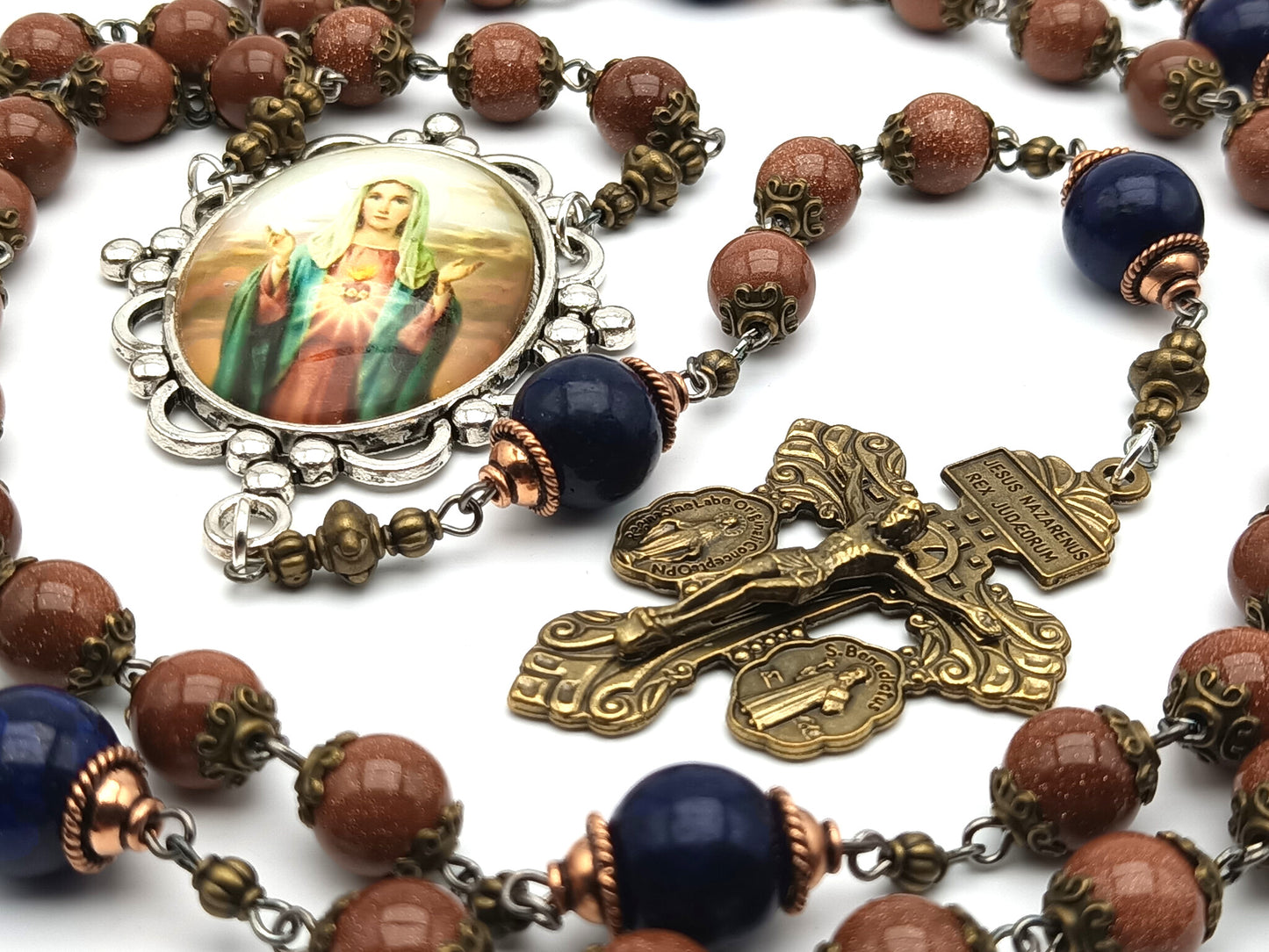 Immaculate Heart unique rosary beads with sparkling rust gemstone beads, blue pater beads, bronze pardon crucifix and silver Our Lady picture centre medal.