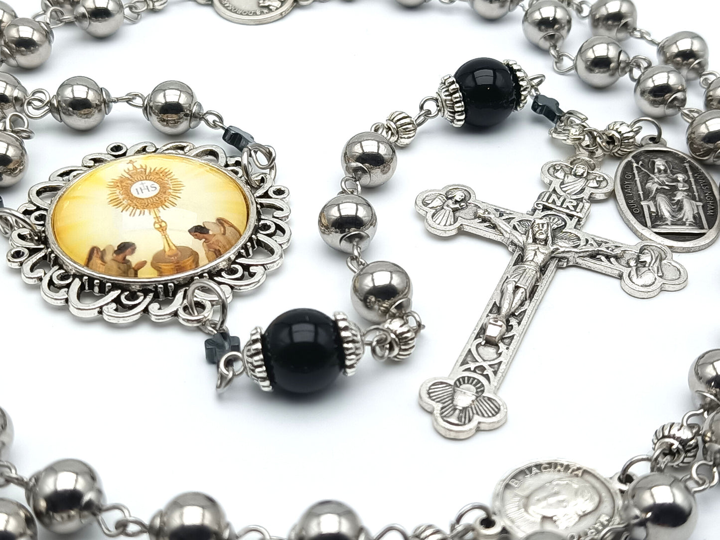 Blessed Sacrament unique rosary beads with stainless steel Ave beads, Onyx and Fatima medal Pater beads, Blessed Sacrament picture centre medal, Blessed Sacrament crucifix and Our Lady of Walsingham medal.