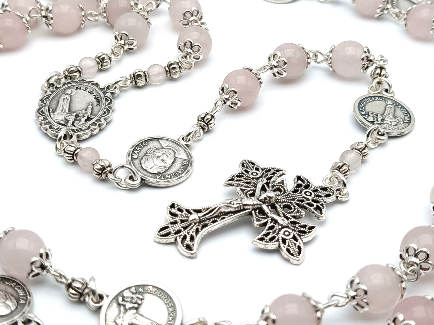 Fatima unique rosary beads with rose quartz gemstone beads, silver lattice crucifix, pater bead medals and centre medal.