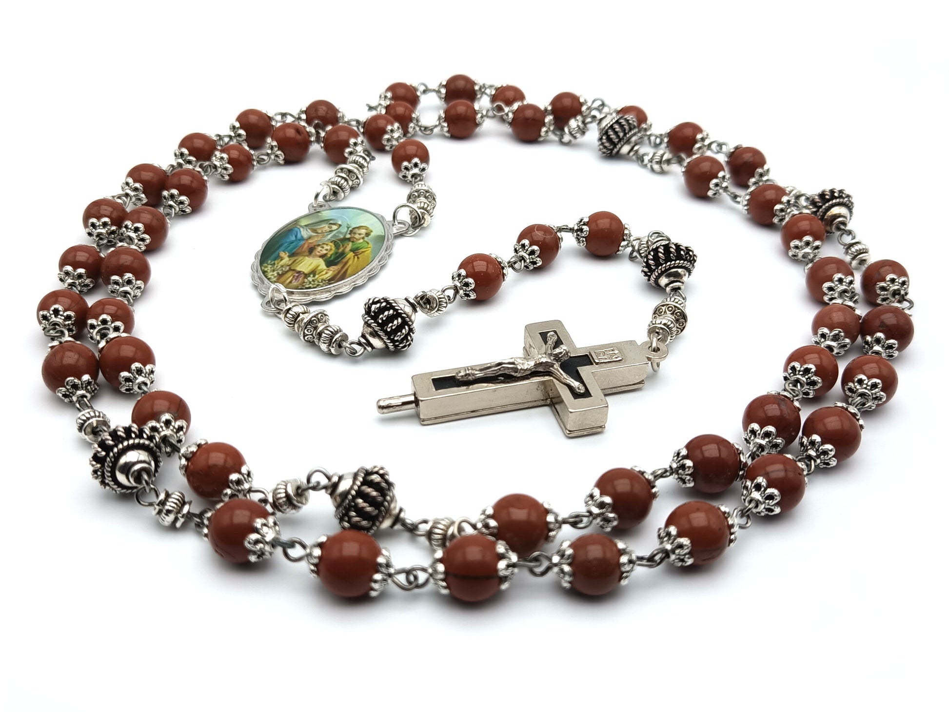 Holy Family unique rosary beads with brown gemstone beads, reliquary crucifix, silver pater beads, and picture centre medal. 