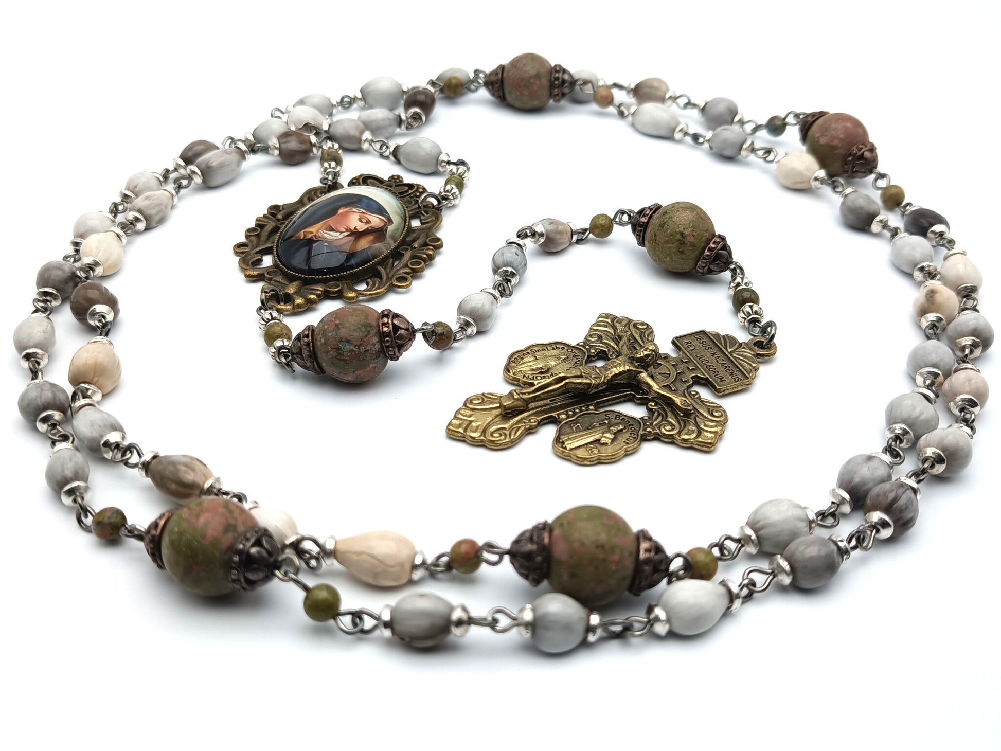 Our Lady of Sorrows unique rosary beads with Jobs tears beads, jasper gemstone pater beads, bronze pardon crucifix and picture centre medal.