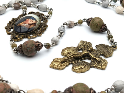 Our Lady of Sorrows unique rosary beads with Jobs tears beads, jasper gemstone pater beads, bronze pardon crucifix and picture centre medal.