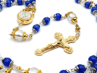 Our Lady of Fatima unique rosary beads with blue and silver foil glass beads, golden crucifix, Fatima centre medal and bead caps.