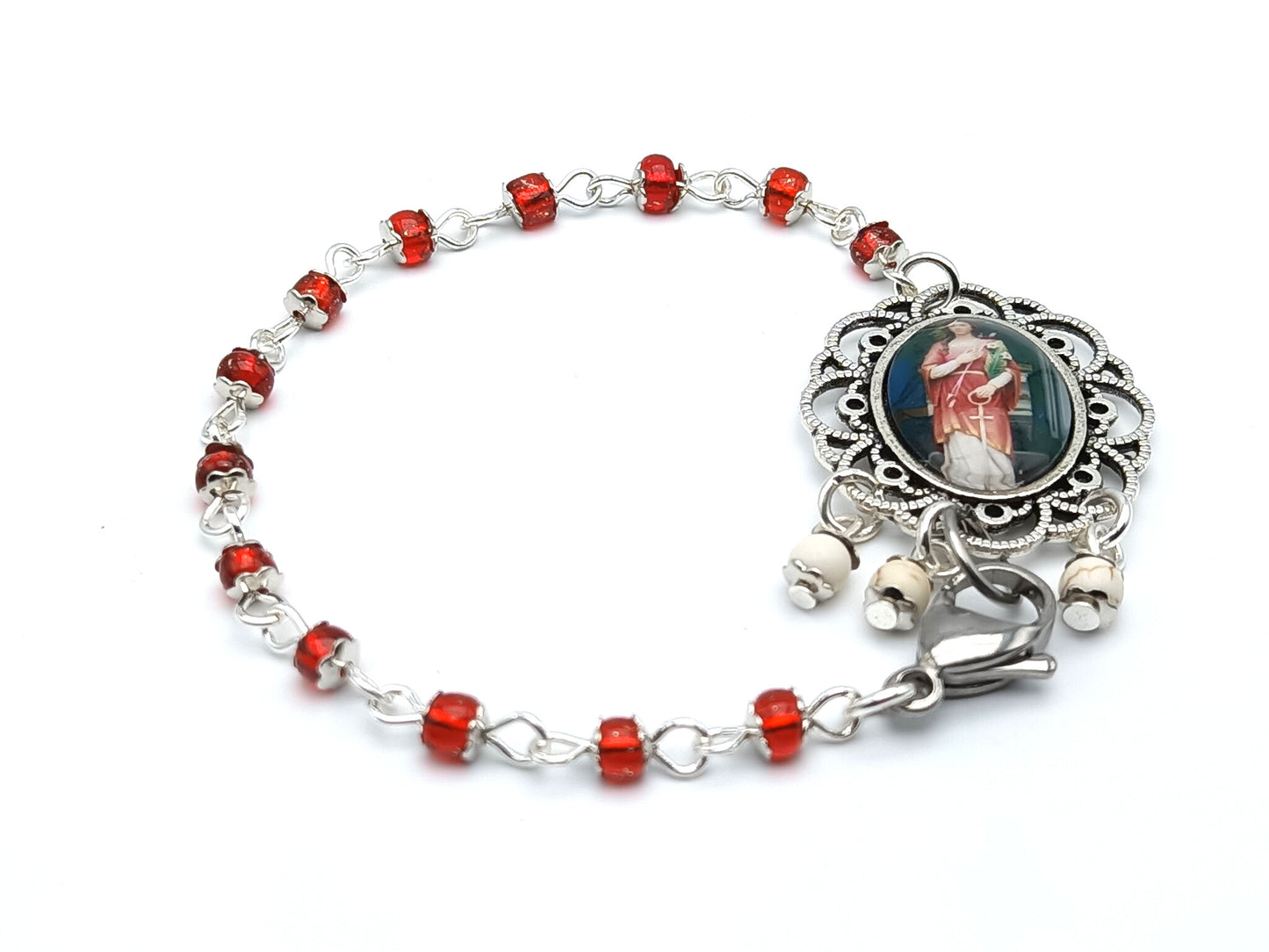 Saint Philomena unique rosary beads prayer chaplet bracelet with red glass beads and ornate centre medal.