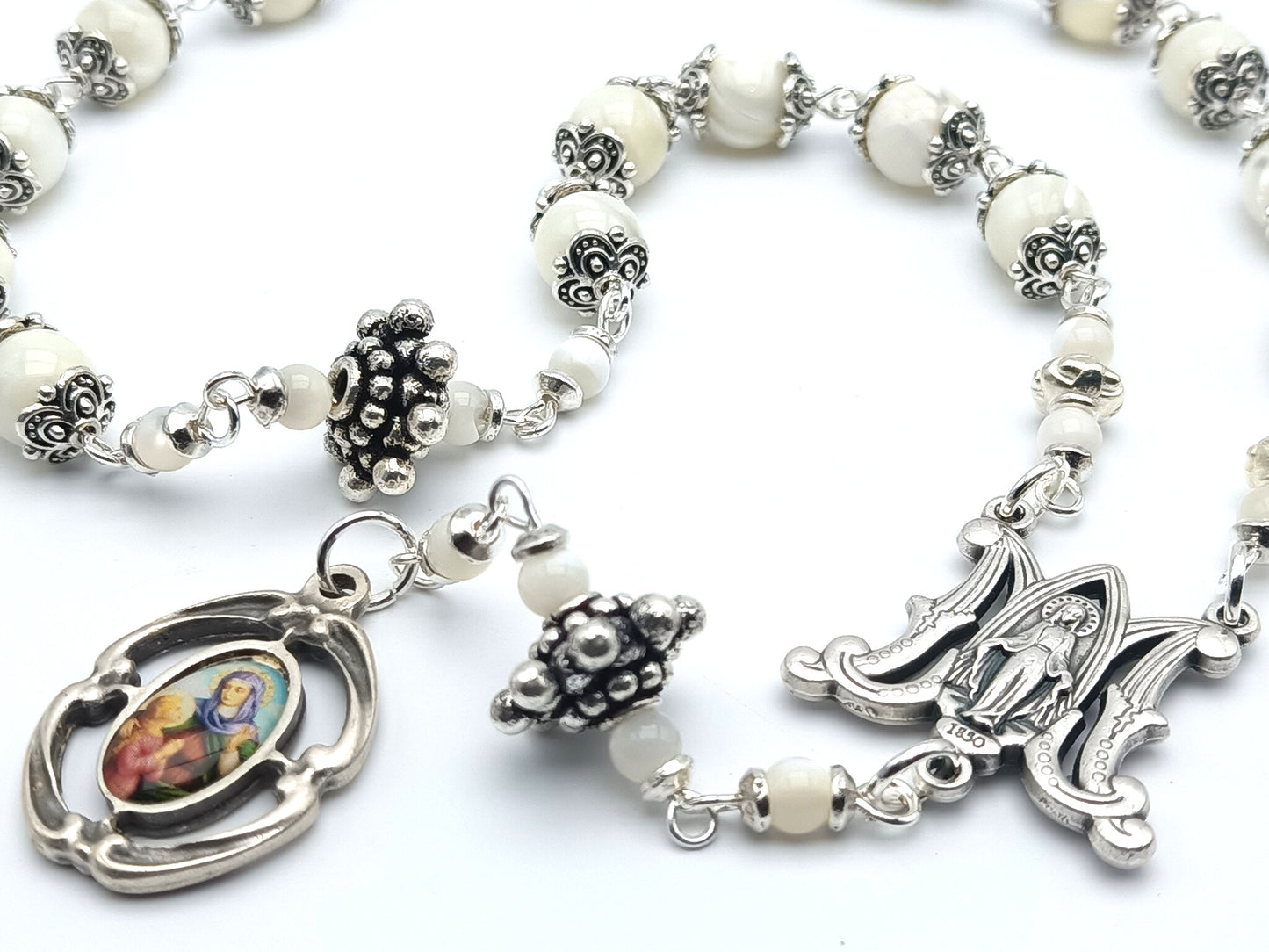 Saint Ann unique rosary beads prayer chaplet, with mother of pearl beads, silver picture medal, bead caps and miraculous medal centre.