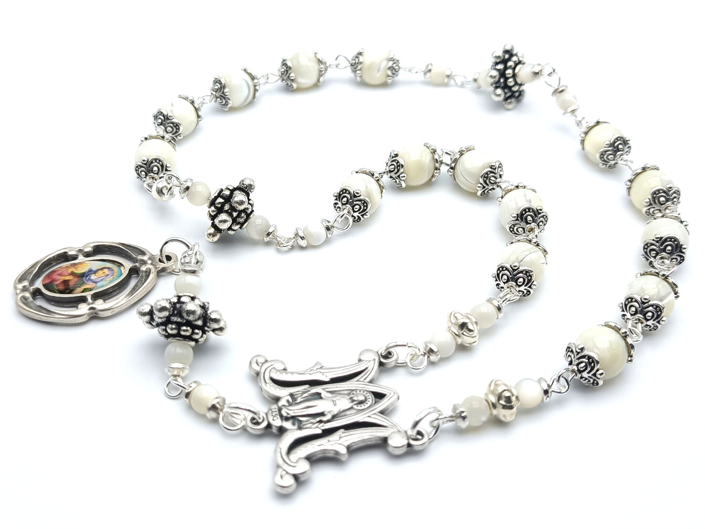 Saint Ann unique rosary beads prayer chaplet, with mother of pearl beads, silver picture medal, bead caps and miraculous medal centre.