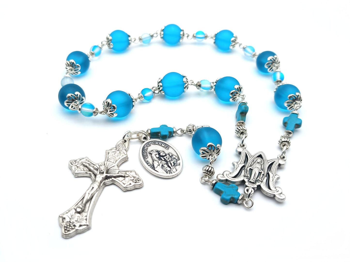 Our Lady of Mount Carmel unique rosary beads single decade with blue glass beads, silver miraculous medal centre medal, vine leaves crucifix and Our Lady of Mount Carmel medal.