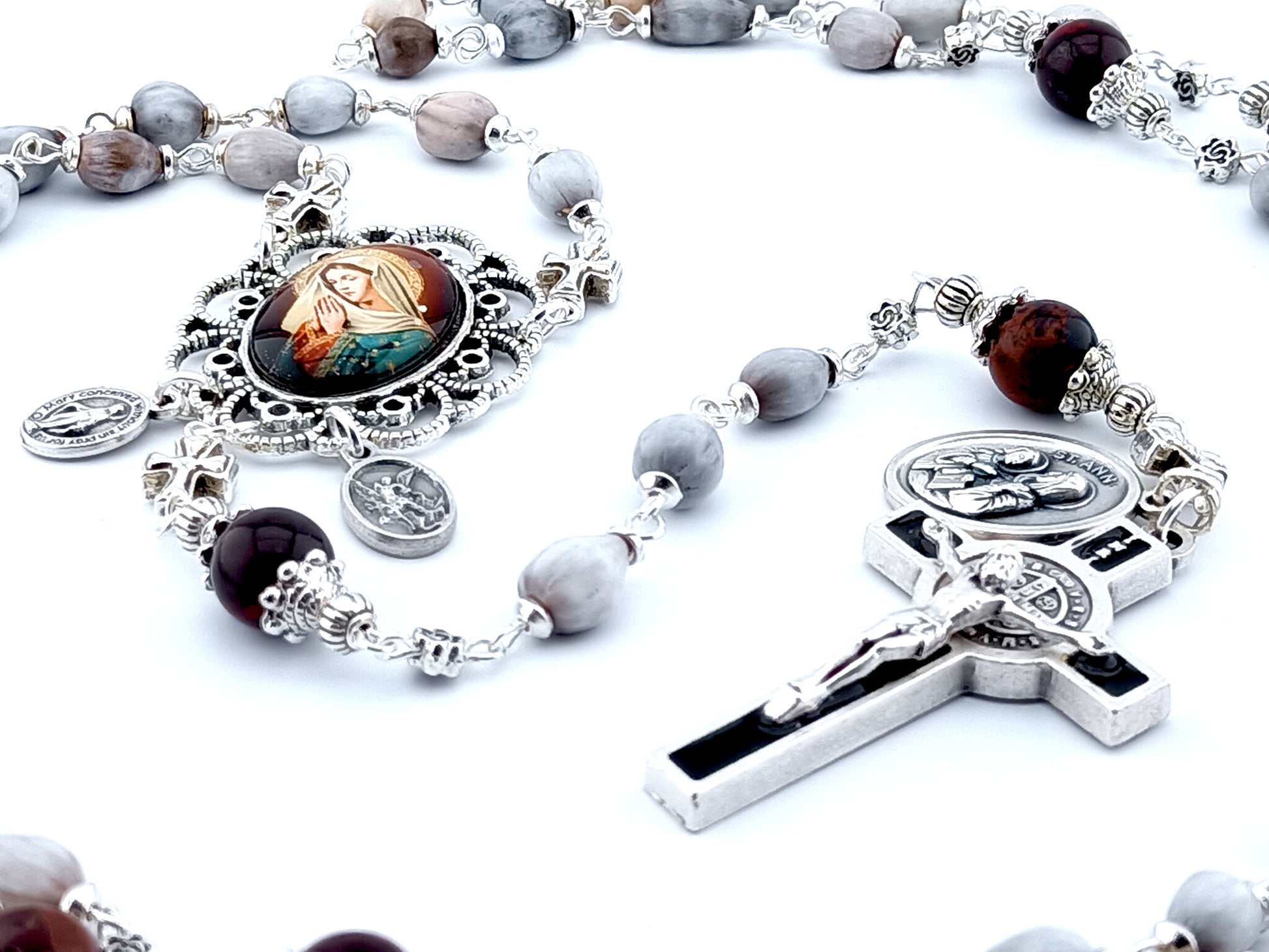 Our Lady of Grace unique rosary beads with Job's Tears and dark red jasper gemstone bead, black enamel Saint Benedict crucifix and picture centre medal.
